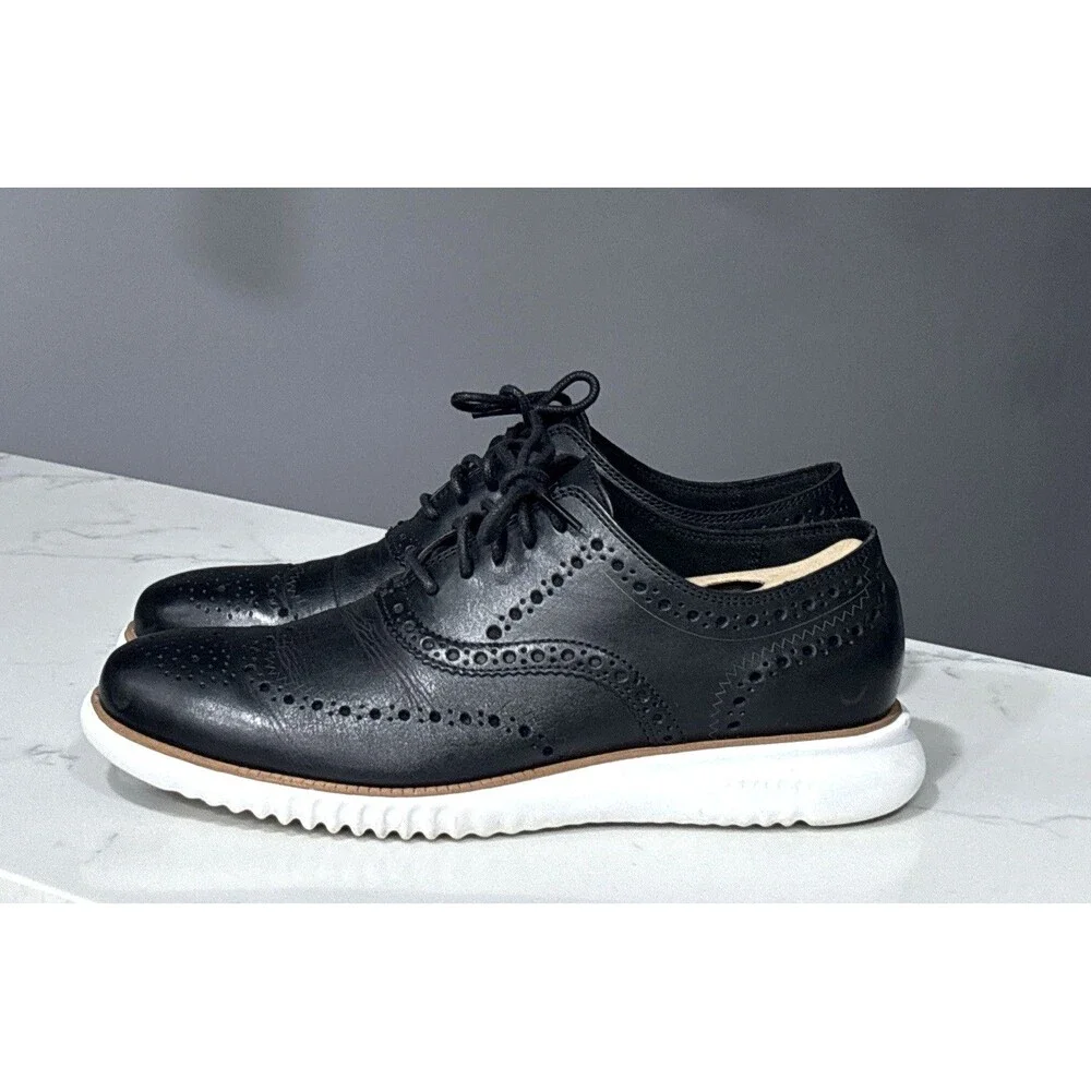 Cole Haan Black Leather Wingtip Sneakers with White Sole